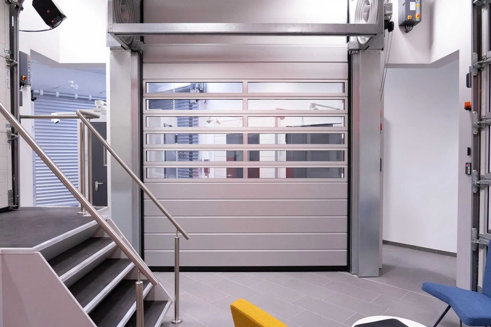 Porte sectionnelle à enroulement rapide