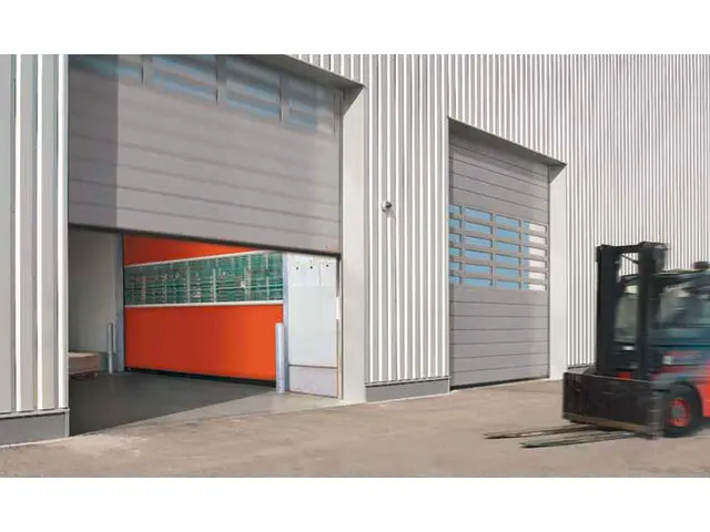 Porte sectionnelle à enroulement rapide